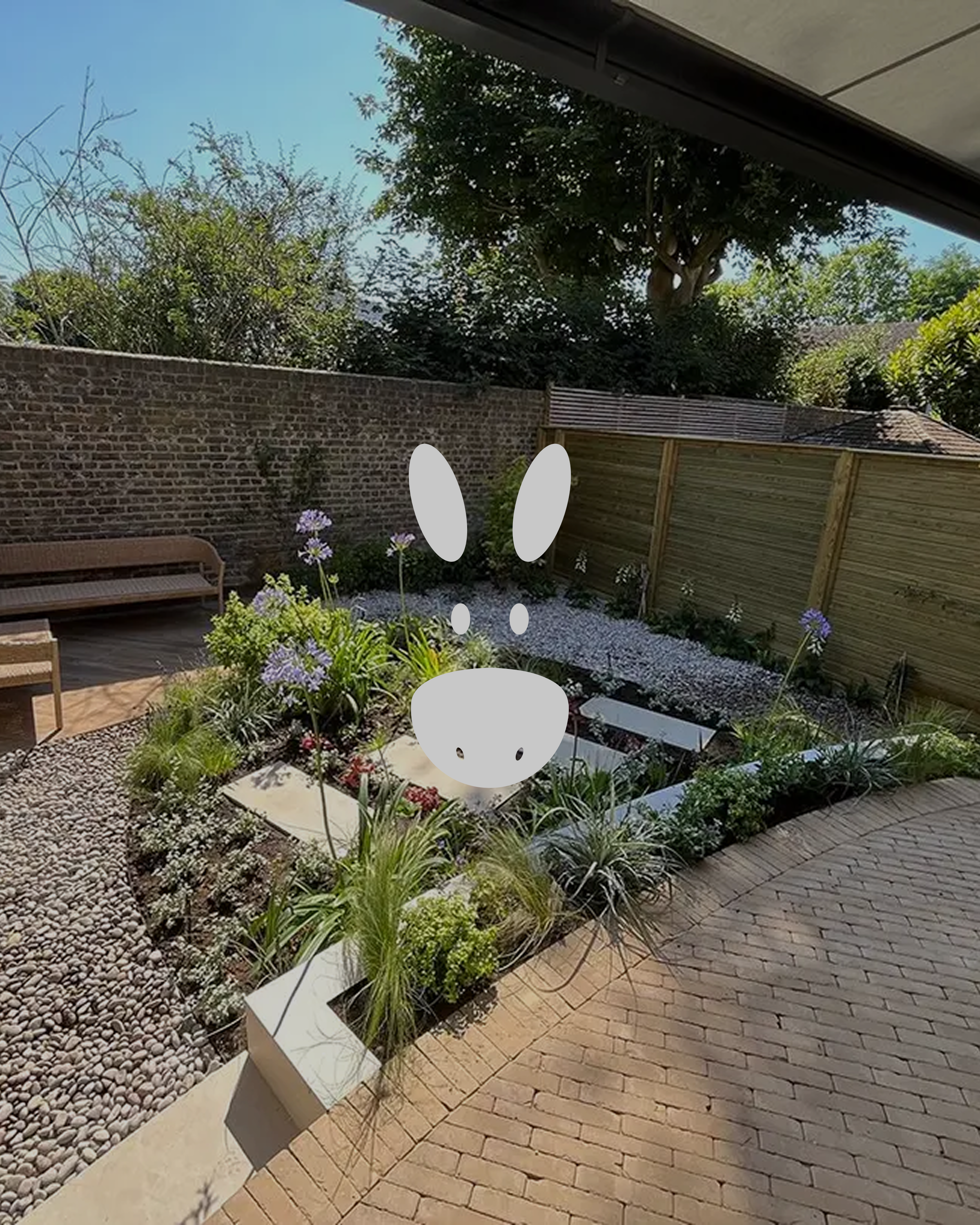 DonkeyJobs identity applied over a finished garden